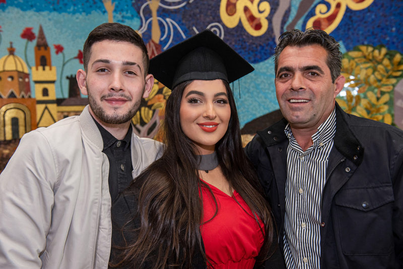 Denisa pictured with her father and brother at the NWRC 2022 Spring Graduations